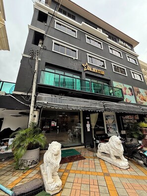 A multi-story building with a storefront labeled 'GOLDEN STAR.' - Golden Star Pattaya By Zuzu (Pattaya)