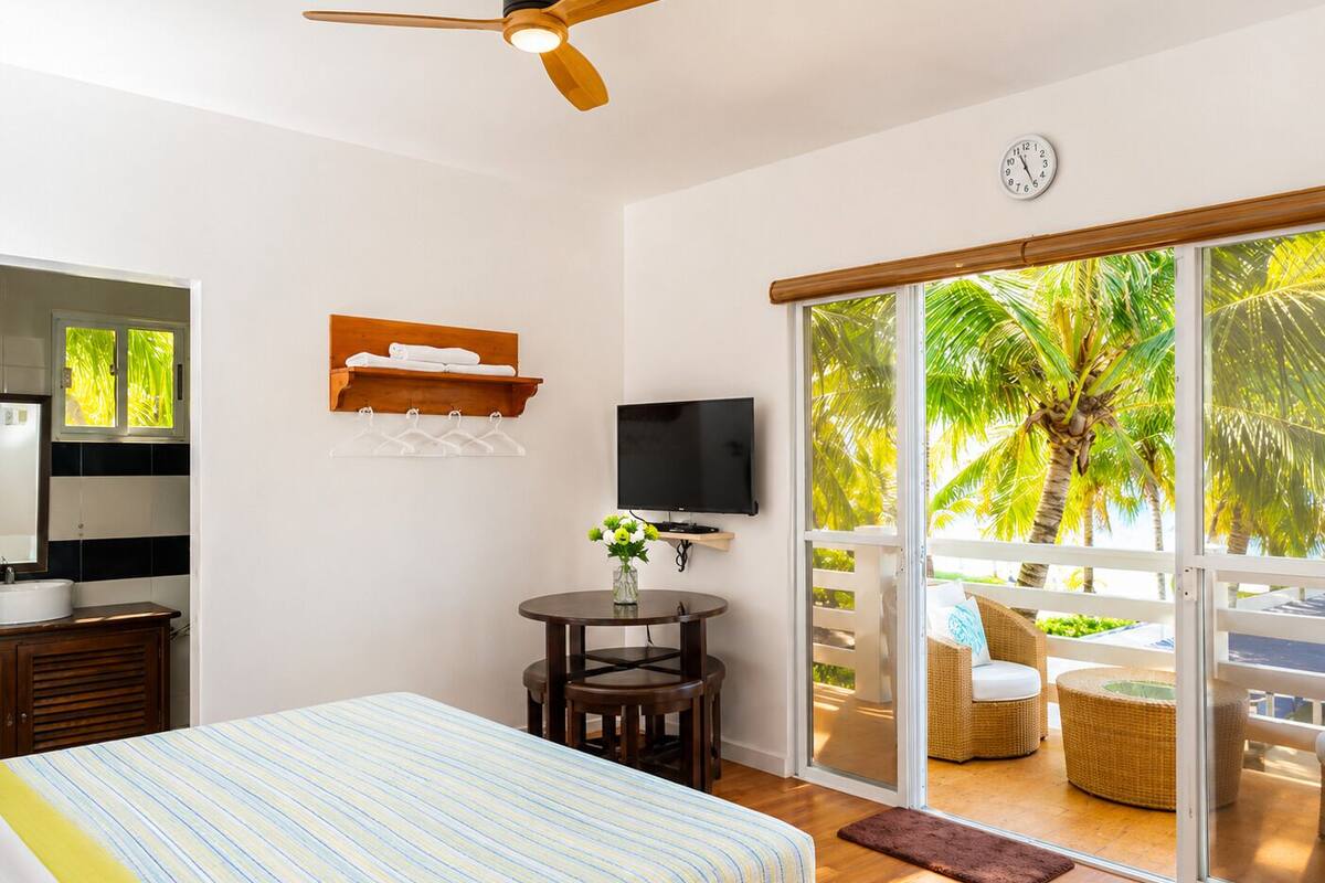 Quarto executivo, vista para a praia | Roupa de cama