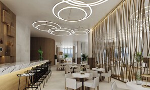 A modern interior with a bar area, multiple seating arrangements, and a decorative ceiling. - Infinity Napa Hotel (Ayia Napa)