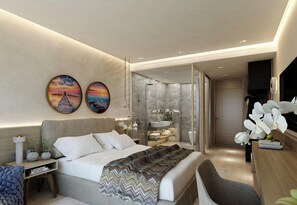 A modern bedroom with a bed, bedside tables, a desk, and a bathroom with a shower and sink. - Infinity Napa Hotel (Ayia Napa)