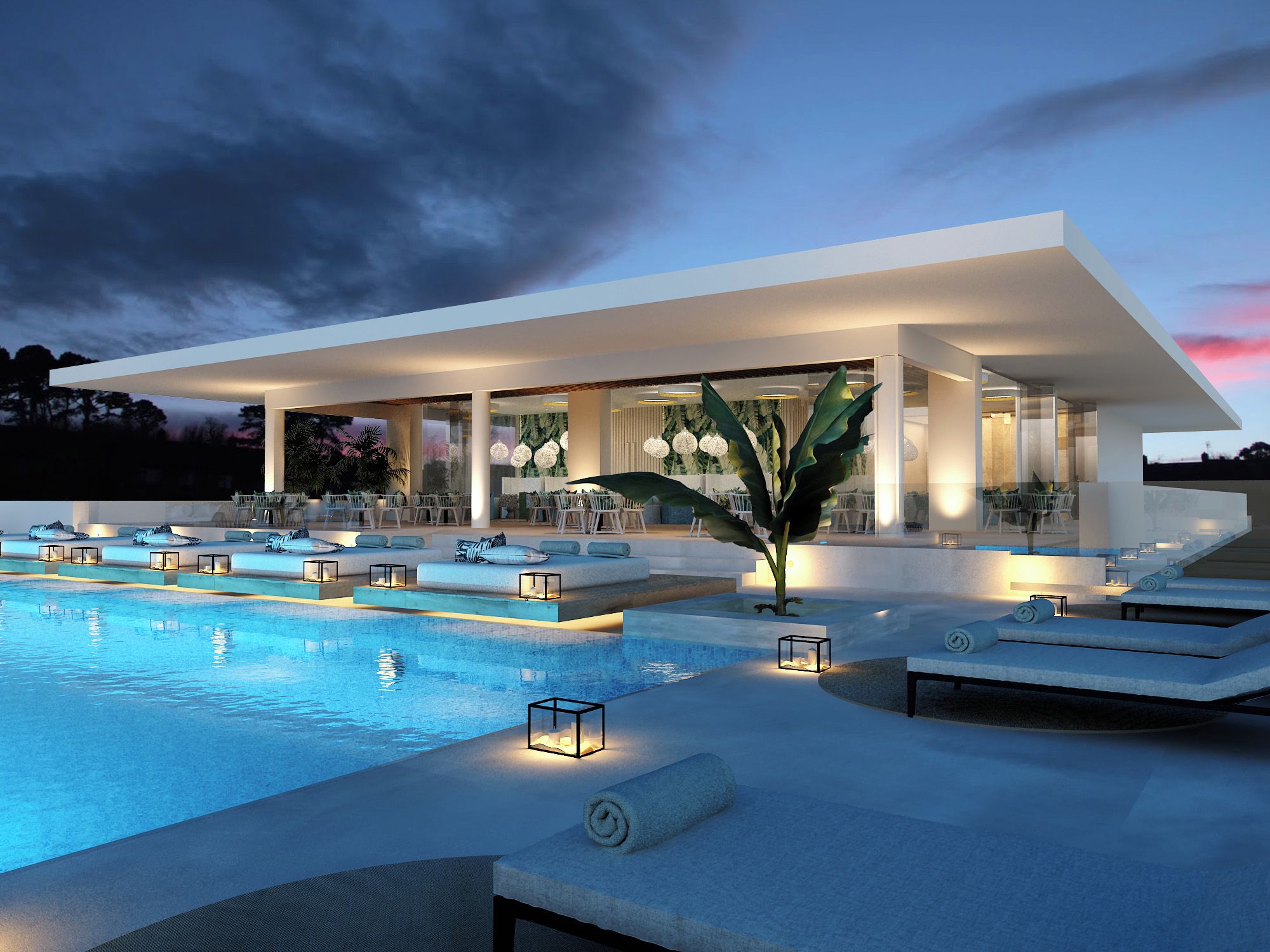 Un área moderna junto a la piscina con sillones de descanso, una piscina y una zona de estar cubierta.