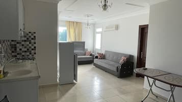 Appartement Confort, balcon, vue ville | Coin séjour