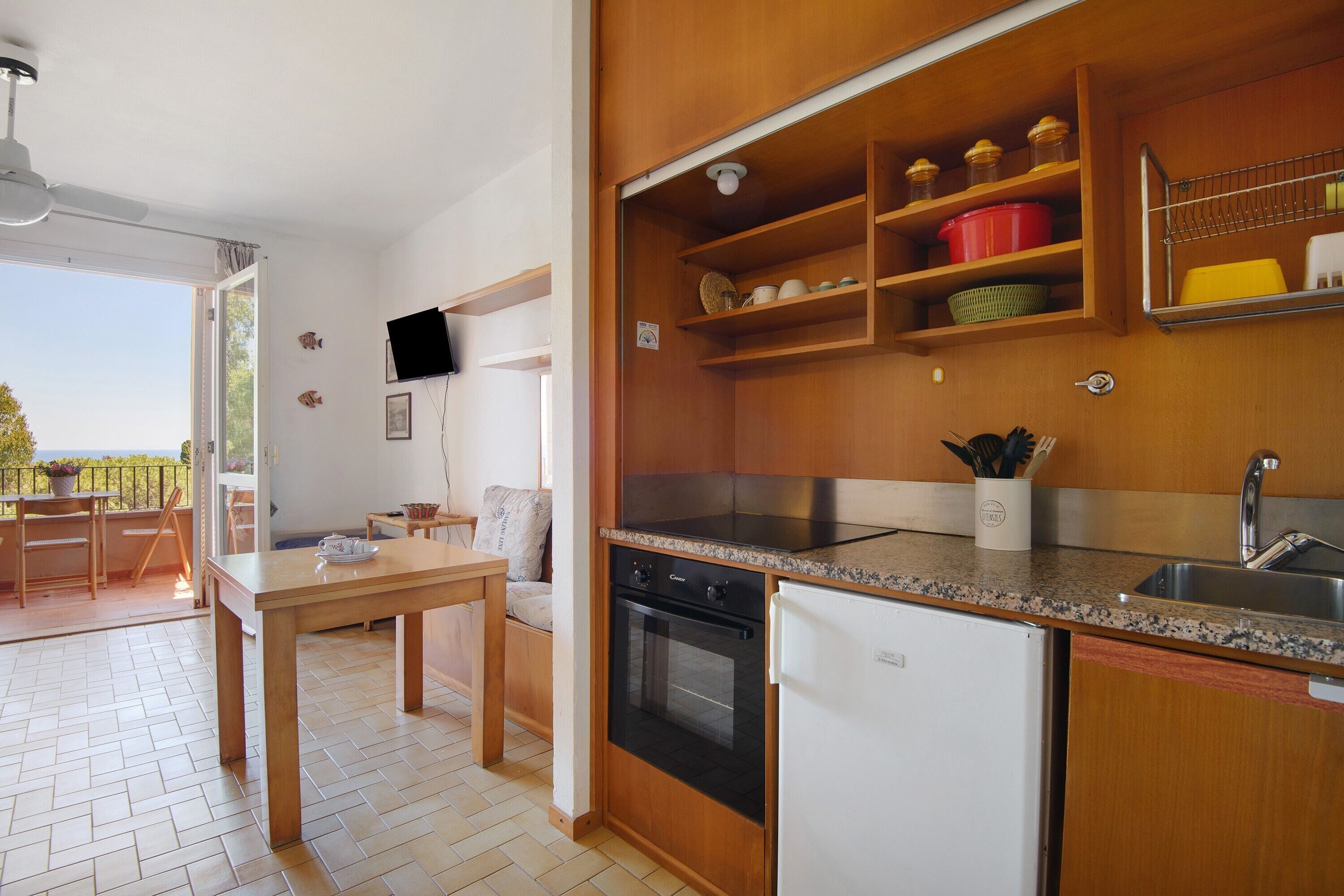 Fridge, stovetop, coffee/tea maker, cookware/dishes/utensils
