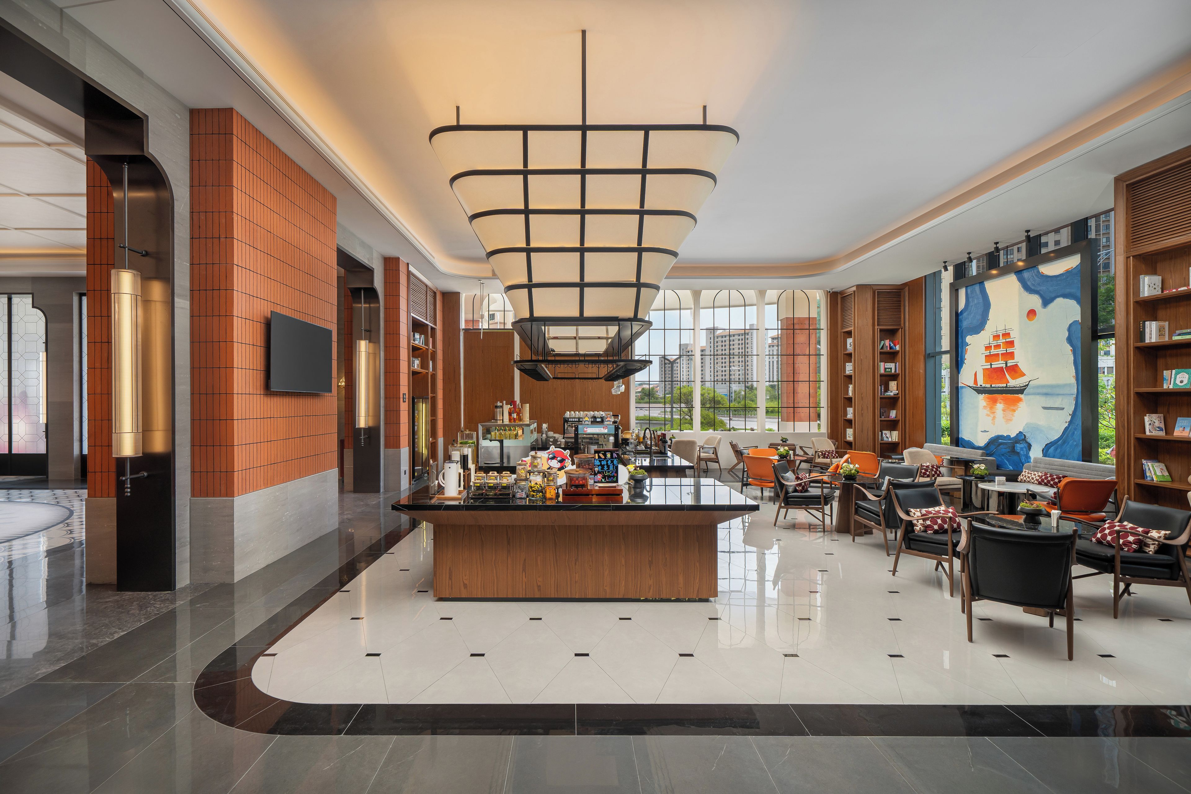 A modern hotel lobby with a central bar area, seating arrangements, and a large window providing a view of the cityscape.