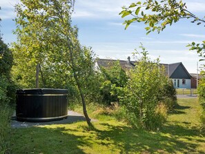 Outdoor spa tub - Spacious holiday home with water view (Redsted)