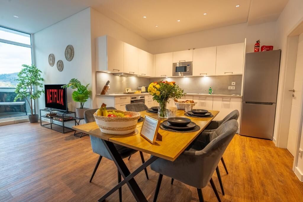 Departamento Deluxe, balcón, vista a la ciudad | Restaurantes