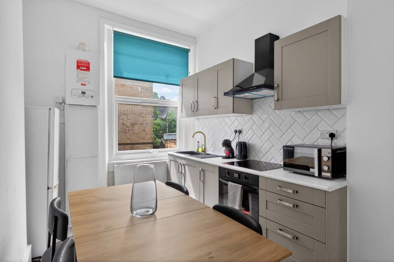 Coffee/tea maker, fridge, microwave, oven