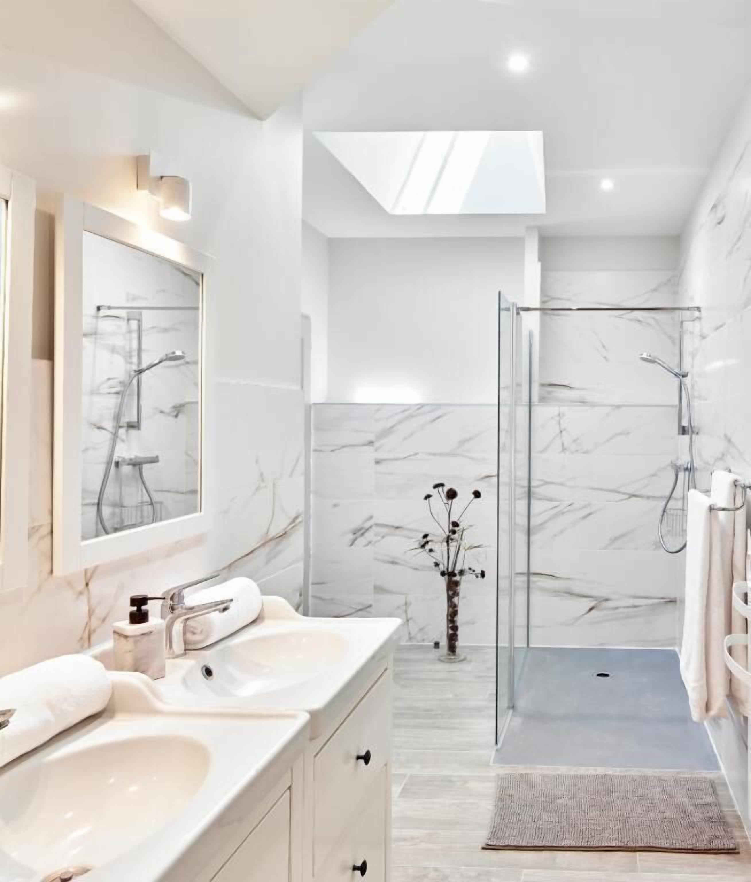 Departamento, vista al jardín | Baño