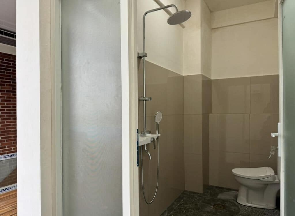 Standard Double Room, Lanai, Pool View | Bathroom | Shower, free toiletries, slippers, towels