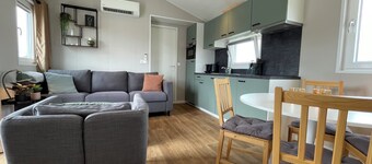 Comfortable holiday home for 4 guests with a waterfront terrace, private swimming ladder, and private mooring dock.