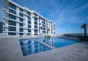 Pool - Seaview Studio with Balcony In Blue Bay Walk (Ajmal Makan)