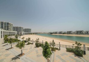 Beach nearby - Oceanfront Balcony Studio w/ Pool & Gym Access (Ajmal Makan)