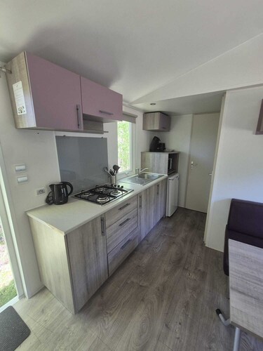 De Kleine Bosparel | Cozy chalet near a recreational lake and forest.