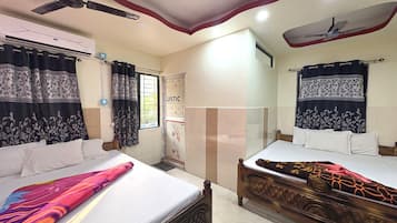 Deluxe Quadruple Room, Air conditioning, City View | Desk, free WiFi