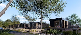 Relax on your private terrace and unwind in the hot tub, surrounded by the peace and fresh air of nature.