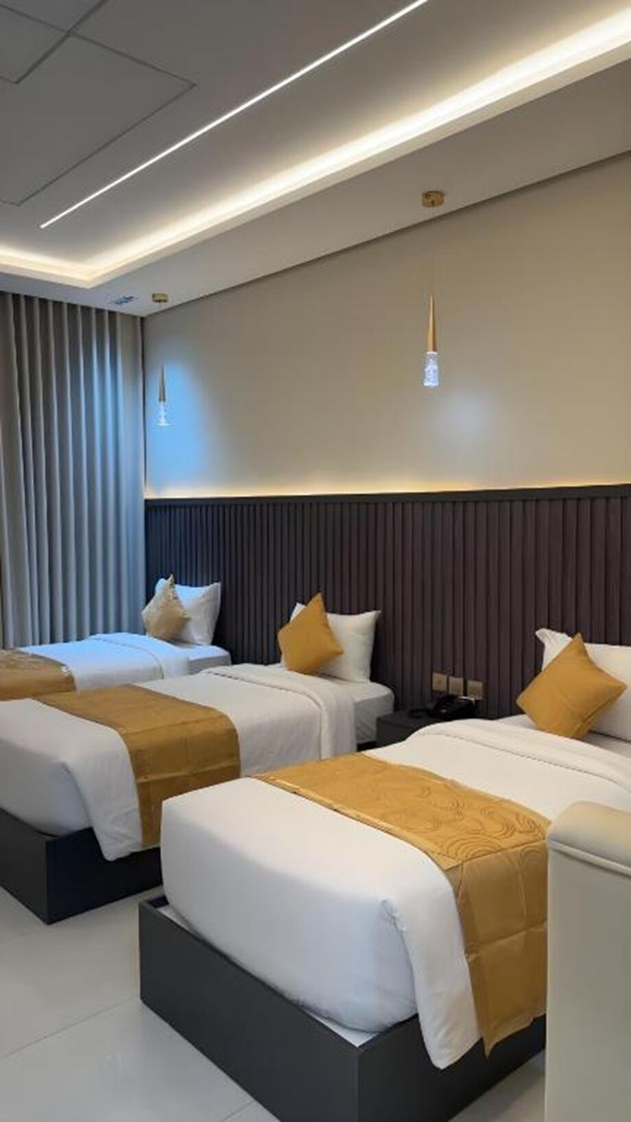 Triple Room, City View | Hypo-allergenic bedding, pillowtop beds, desk, blackout drapes