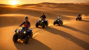 Three off-road vehicles on a desert sand dune. - Sultan Luxury Camp  (Merzouga)