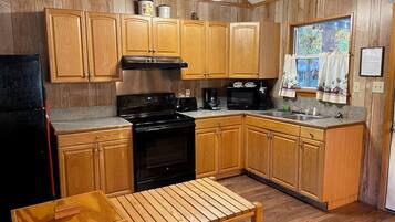 Microwave, coffee/tea maker, cookware/dishes/utensils