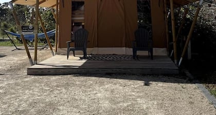 Charming Standard Safari Tent with Fire Pit Near Jonathan Dickinson State Park in Hobe Sound, Florida