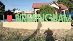 A sign with 'I ♥ BIRMINGHAM' and a heart symbol. - Whole House, Wifi, Full-AC, w/ Front Garden (General Trias)