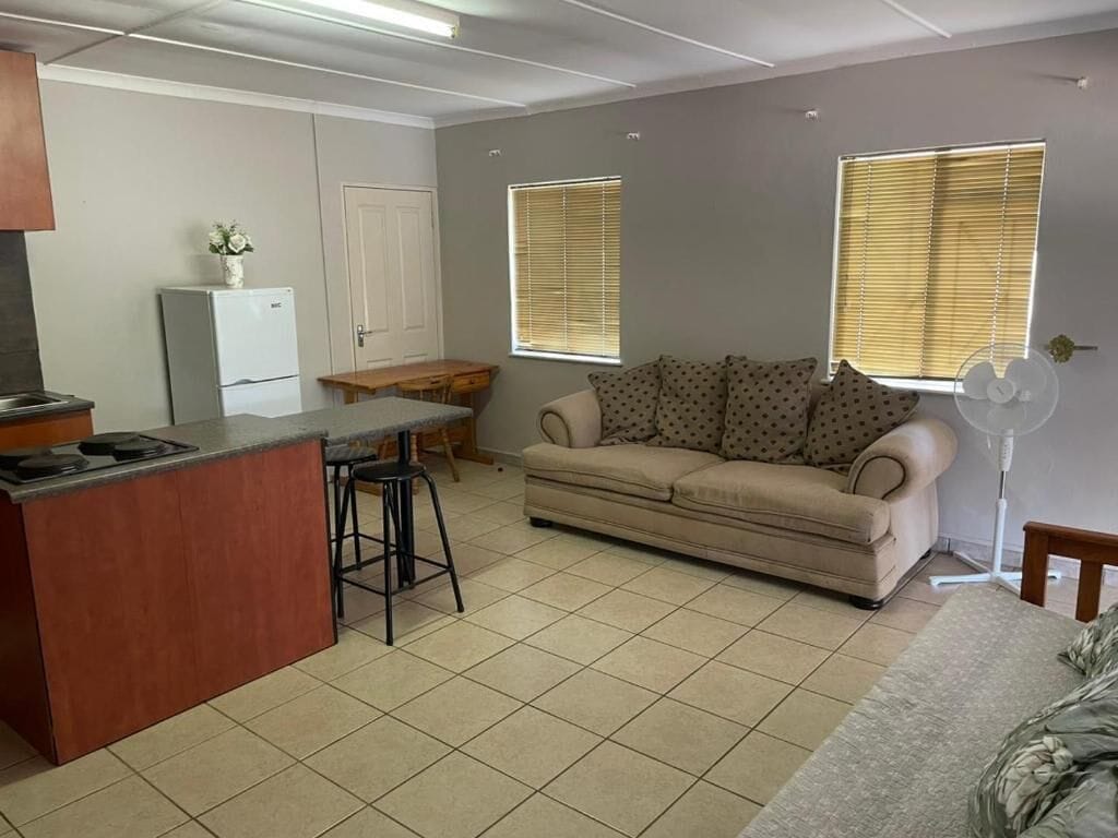 Chambre Double Familiale, patio, vue jardin | Coin séjour