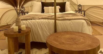 Enchanted Woodland Glamping Tent with Fire Pit & Clubhouse Kitchen Access Near Gentry, Arkansas