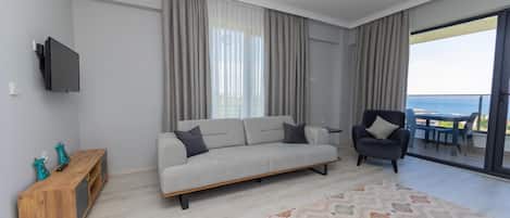 Comfort-Apartment, Balkon, Meerblick | Wohnbereich