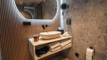 Junior Suite, 1 King Bed with Sofa bed, Courtyard Area | Bathroom | Shower, free toiletries, hair dryer, slippers
