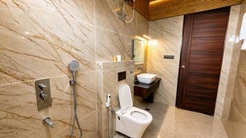 Deluxe Double Room, Balcony, Mountain View | Bathroom | Shower, towels, soap, shampoo