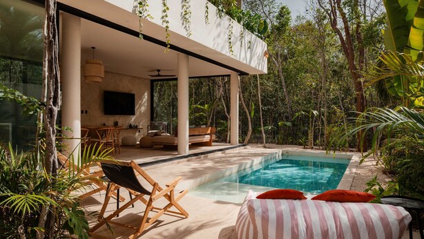 A modern house with a pool, outdoor seating, and lush greenery. - Villa Lumila Rooftop Sunset & Jungle Views (Tulum)