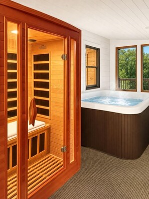 A sauna room with wooden walls and a hot tub. - Luxury Catskills Creekside Cabin | Pool, Sauna & Fire Pit Retreat (Roscoe)