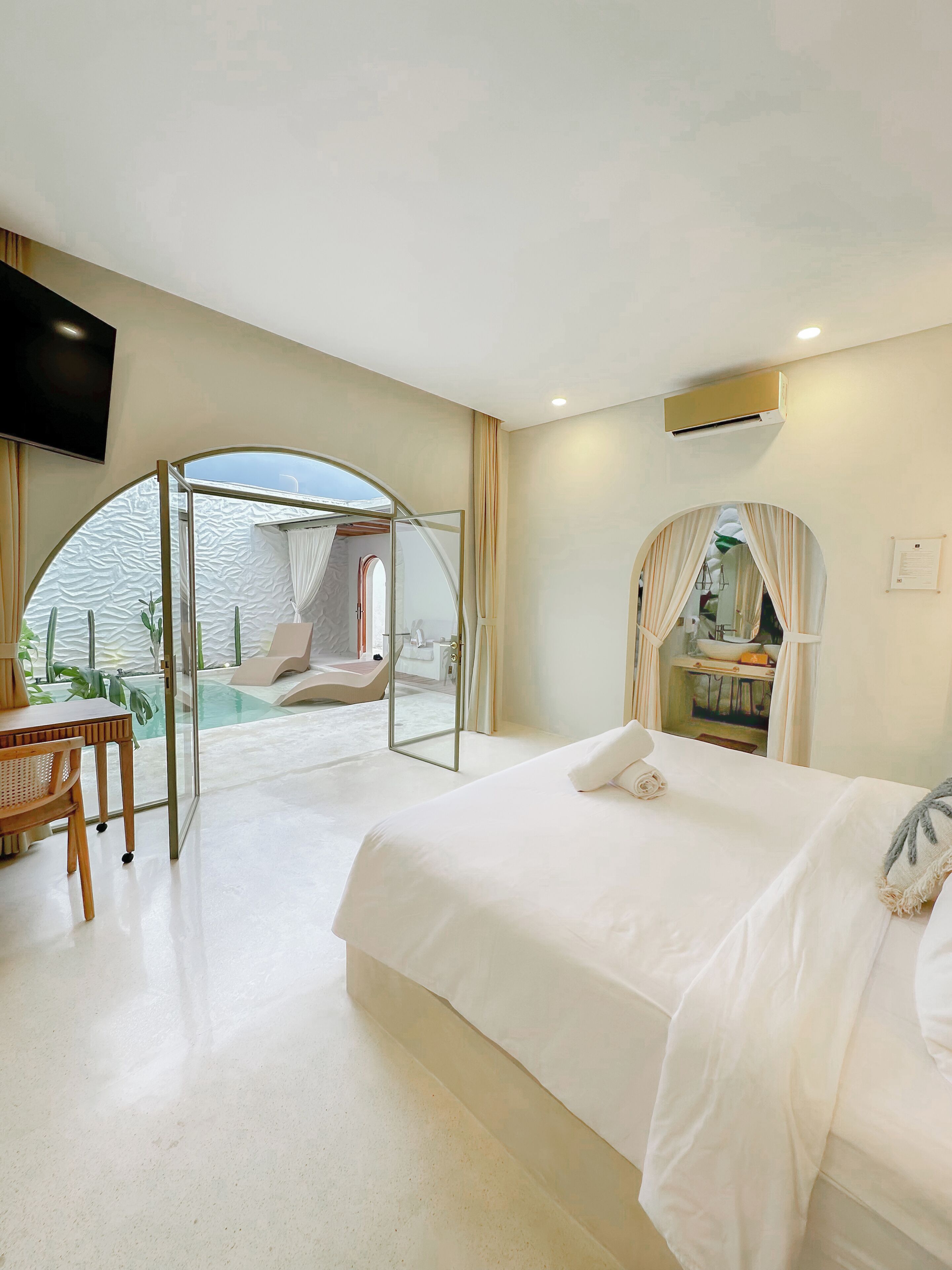 Deluxe Double Room, Pool View | Desk, laptop workspace, blackout drapes, iron/ironing board