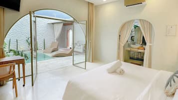 Deluxe Double Room, Pool View | Desk, laptop workspace, blackout drapes, iron/ironing board