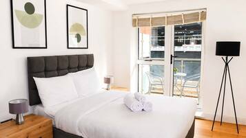 1 bedroom, desk, iron/ironing board, travel cot