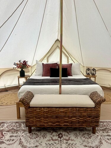 Enchanting Mountain Glamping Tents with Elevated Decks and Fire Pit Near Gentry, AR