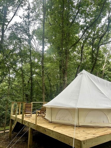 Enchanting Mountain Glamping Tents with Elevated Decks and Fire Pit Near Gentry, AR
