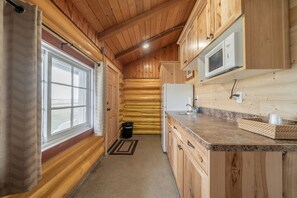Fridge, microwave, dining tables - Peaceful Log Cabin near Jackson Hole for an Amazing Outdoor Escape in Ashton, Idaho (Ashton)