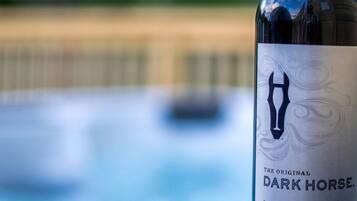 A bottle of Dark Horse Cabernet Sauvignon 2015 with a label featuring a horse silhouette.