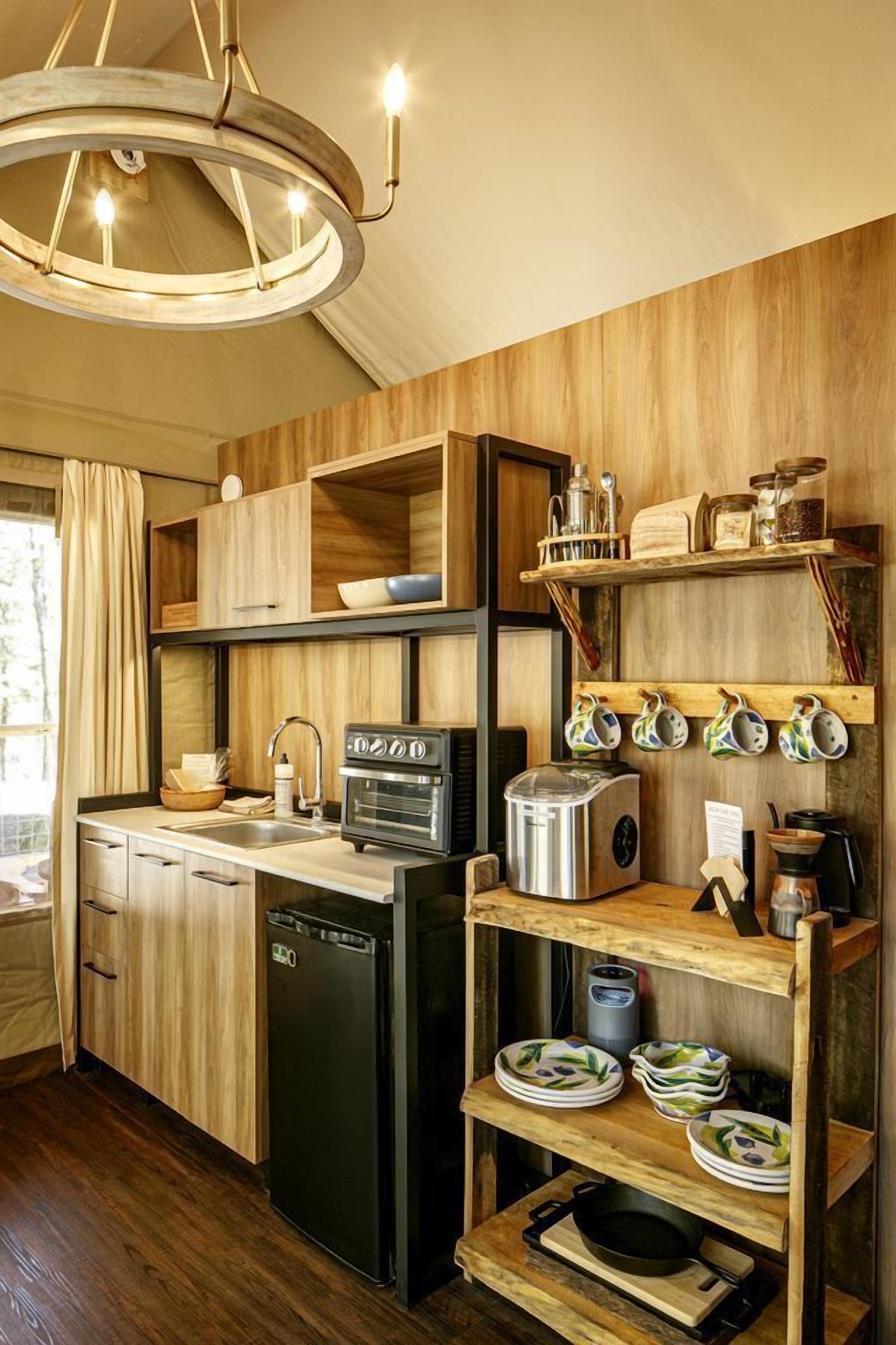 Fridge, microwave, coffee/tea maker, cookware/dishes/utensils