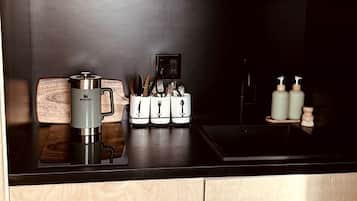Coffee/tea maker, microwave, toaster, cookware/dishes/utensils