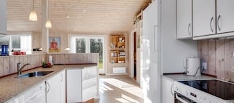 Bright holiday home with electric charger, terrace and wood-burning stove