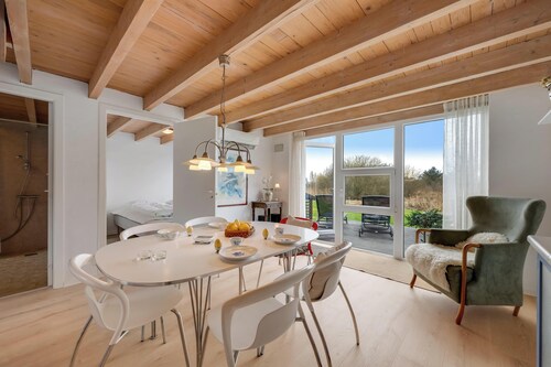 Lovely holiday home with a view of the fishing lake and the fjord.