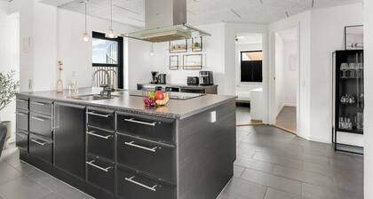 Renovated holiday home with enclosed terrace, centrally located in Vorupør
