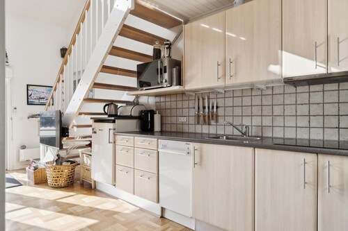 Charming holiday home with swimming pool and shared activities in Agger
