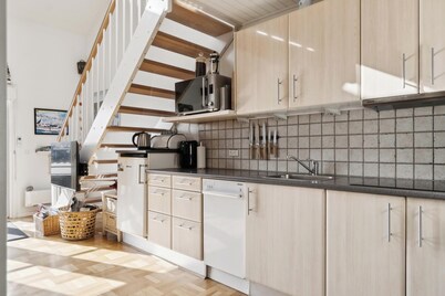 Charming holiday home with swimming pool and shared activities in Agger