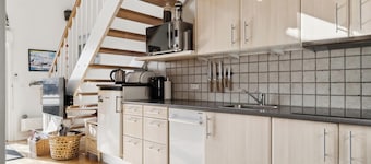 Charming holiday home with swimming pool and shared activities in Agger