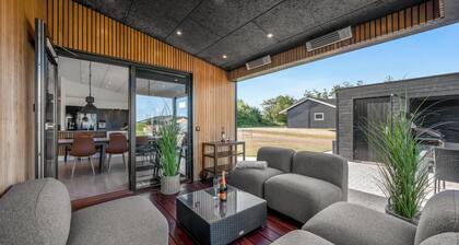 Lovely holiday home with mini golf course, sauna, wilderness bath and view of.