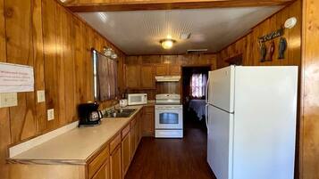 Coffee/tea maker, microwave, cookware/dishes/utensils