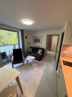 Appartement Deluxe, balcon, vue sur la ville | Aire de séjour