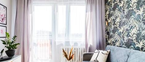 Suite Deluxe, vue ville | Coin séjour